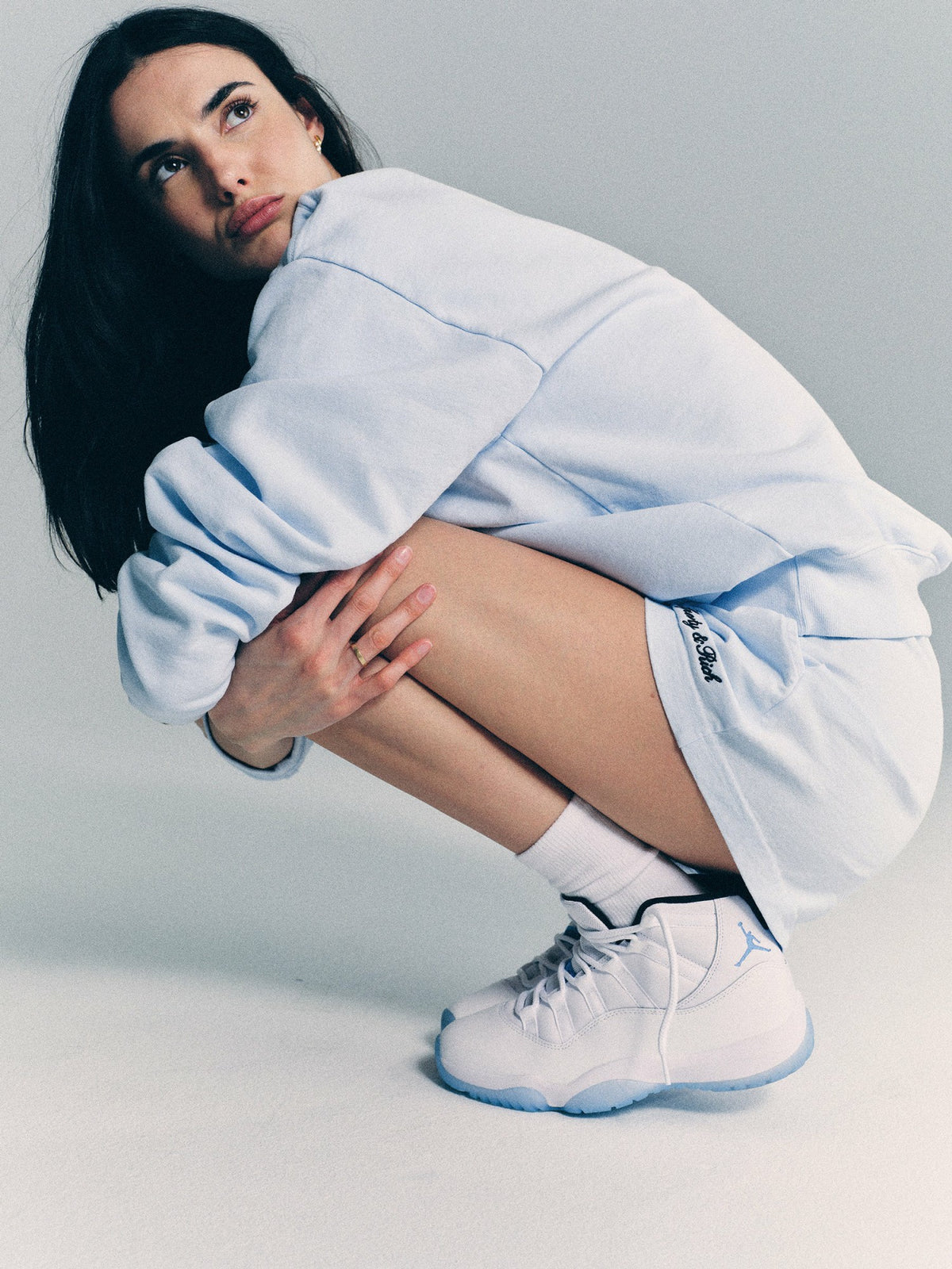 Sporty & Rich Syracuse Embroidered Disco short - Ciel/Navy
